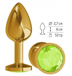 Золотистая конусовидная анальная пробка с салатовым кристаллом - 7 см.