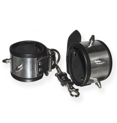 Серебристо-черные наручники с шипами и металлическим блеском