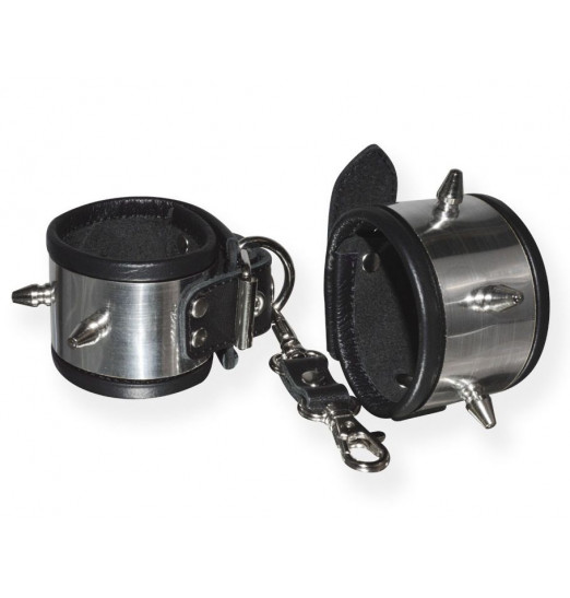 Серебристо-черные наручники с шипами и металлическим блеском