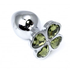 Серебристая анальная втулка с клевером из лаймовых кристаллов - 9 см.