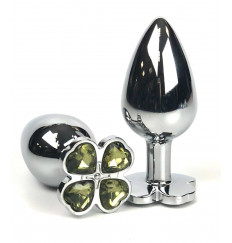 Серебристая анальная втулка с клевером из лаймовых кристаллов - 9 см.