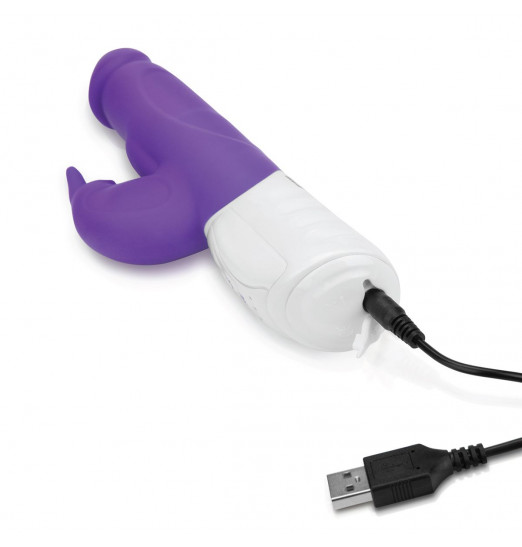 Фиолетовый перезаряжаемый вибратор с клиторальным стимулятором - 25 см. Фиолетовый перезаряжаемый вибратор с клиторальным стимулятором - 25 см.