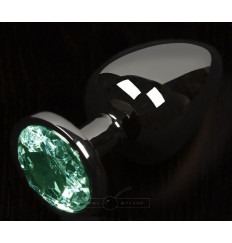 Графитовая анальная пробка с зеленым кристаллом - 6 см.