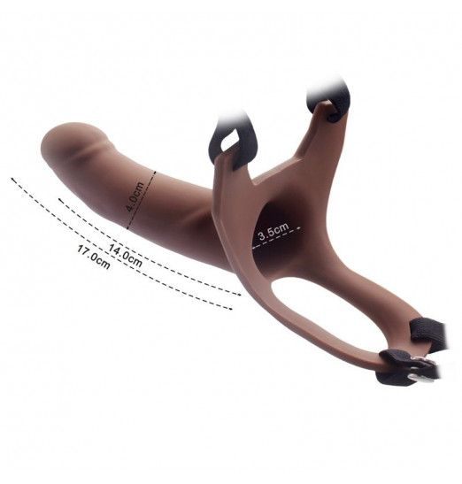 Коричневый полый фаллопротез на черных лентах - 15,5 см.