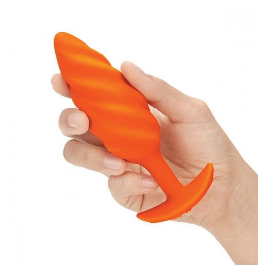Оранжевый спиральный анальный виброплаг Swirl - 13,5 см. Оранжевый спиральный анальный виброплаг Swirl - 13,5 см.