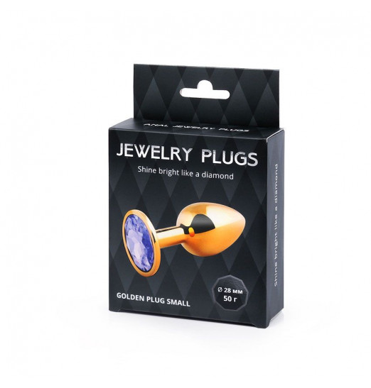 Золотистая анальная пробка с фиолетовым стразом - 7,2 см.