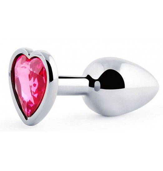 Серебристая анальная пробка с розовым кристаллом-сердечком - 7 см. Серебристая анальная пробка с розовым кристаллом-сердечком - 7 см.