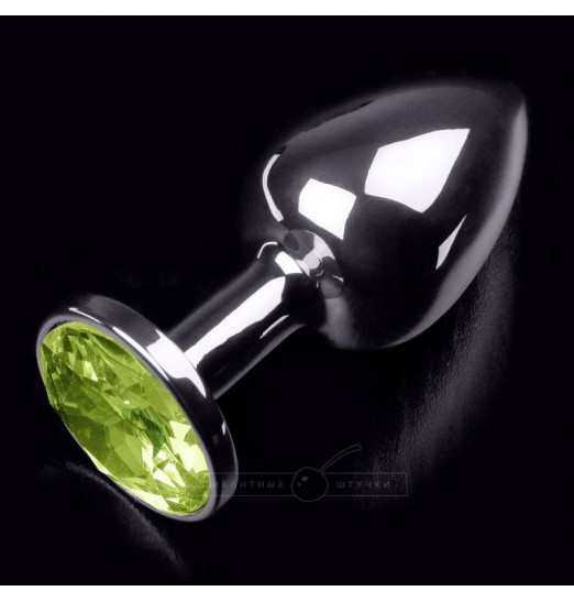 Маленькая серебристая анальная пробка с желтым кристаллом - 7 см.