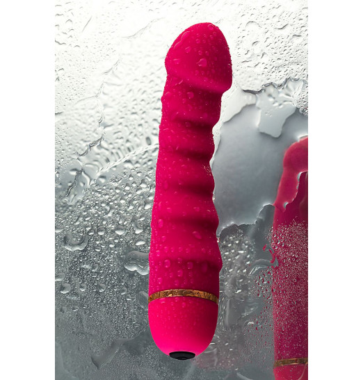 Розовый рельефный вибромассажер - 16 см.