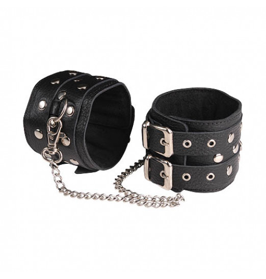 Чёрные кожаные оковы, соединенные цепочкой Чёрные кожаные оковы, соединенные цепочкой