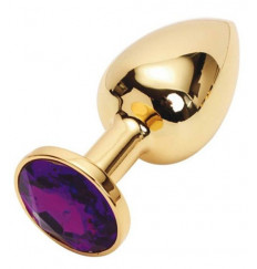 Золотистая металлическая анальная пробка с фиолетовым стразом - 7,6 см.