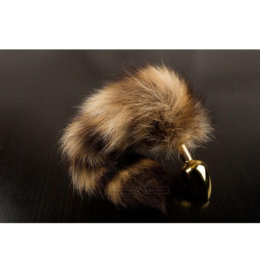 Маленькая золотистая пробка с хвостом енота - 7,5 см.