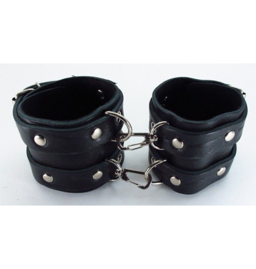 Широкие черные наручники с двумя ремешками