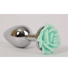 Серебристая анальная пробка с зеленой розочкой - 7,6 см.