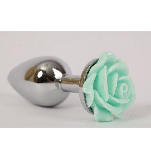 Серебристая анальная пробка с зеленой розочкой - 7,6 см.