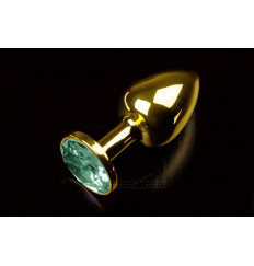 Маленькая золотистая анальная пробка с круглым кончиком и изумрудным кристаллом - 7 см.