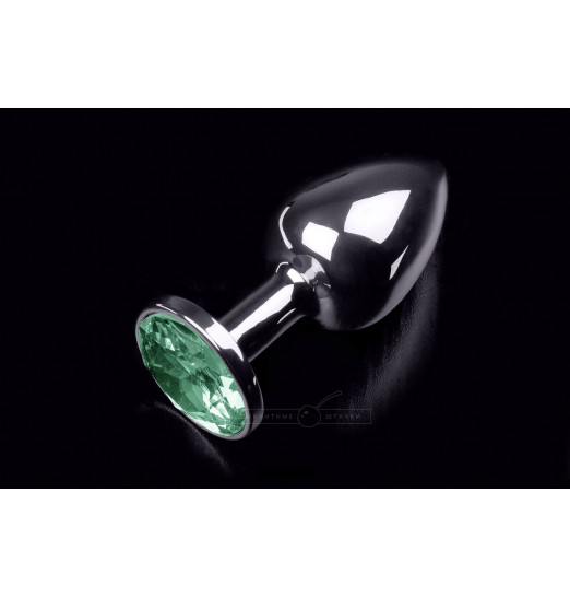 Маленькая серебристая анальная пробка с круглым кончиком и изумрудным кристаллом - 7 см.