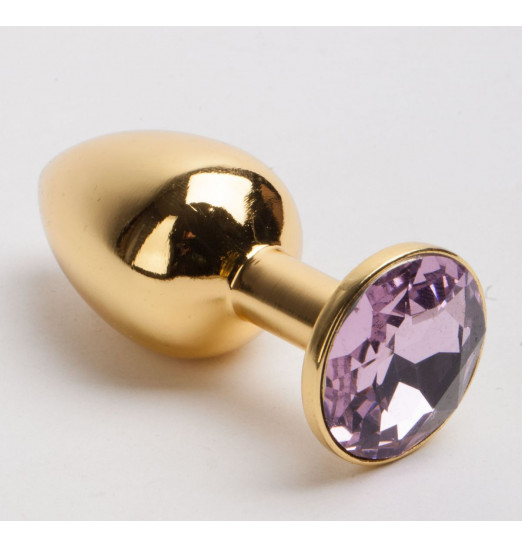 Золотистая металлическая анальная пробка с розовым стразом - 9,5 см. Золотистая металлическая анальная пробка с розовым стразом - 9,5 см.