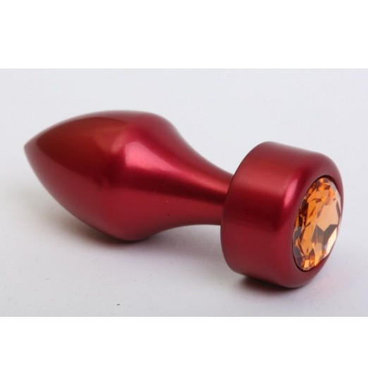 Красная анальная пробка с широким основанием и желтым кристаллом - 7,8 см. Красная анальная пробка с широким основанием и желтым кристаллом - 7,8 см.