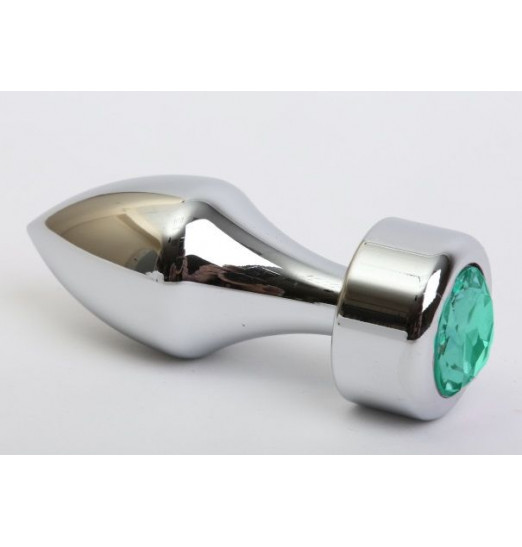 Серебристая анальная пробка с широким основанием и зелёным кристаллом - 7,8 см.