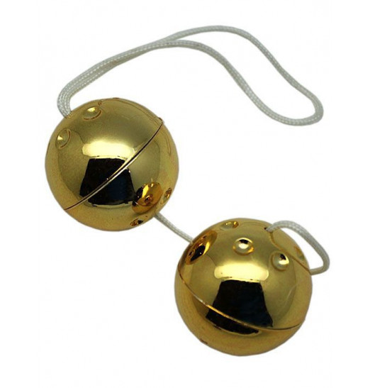 Золотистые шарики со смещённым центром тяжести