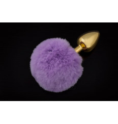 Маленькая золотистая пробка с пушистым фиолетовым хвостиком