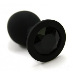 Чёрная силиконовая анальная пробка с чёрным кристаллом - 7 см.
