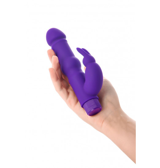 Фиолетовый вибратор с утолщением посередине и клиторальным зайчиком - 18 см. Фиолетовый вибратор с утолщением посередине и клиторальным зайчиком - 18 см.