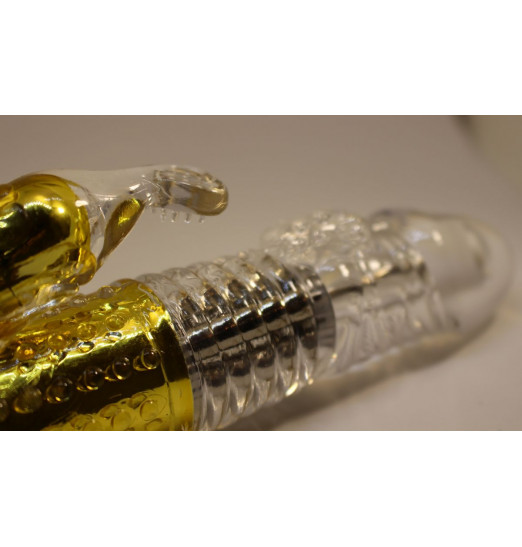 Золотистый вибратор с 24 видами вибрации и ротации - 21 см. Золотистый вибратор с 24 видами вибрации и ротации - 21 см.