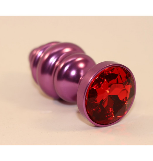 Фиолетовая фигурная пробка с красным кристаллом - 7,3 см.