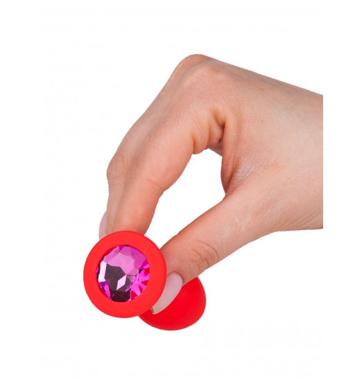 Красная анальная втулка с малиновым кристаллом - 7,3 см. Красная анальная втулка с малиновым кристаллом - 7,3 см.