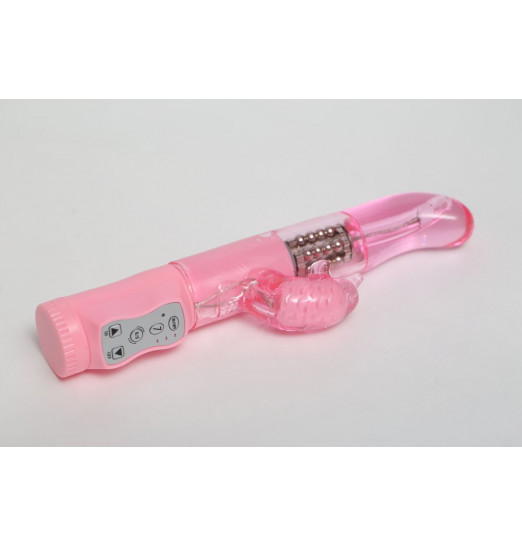 Розовый вибратор с изогнутой головкой и ротацией - 21,5 см.