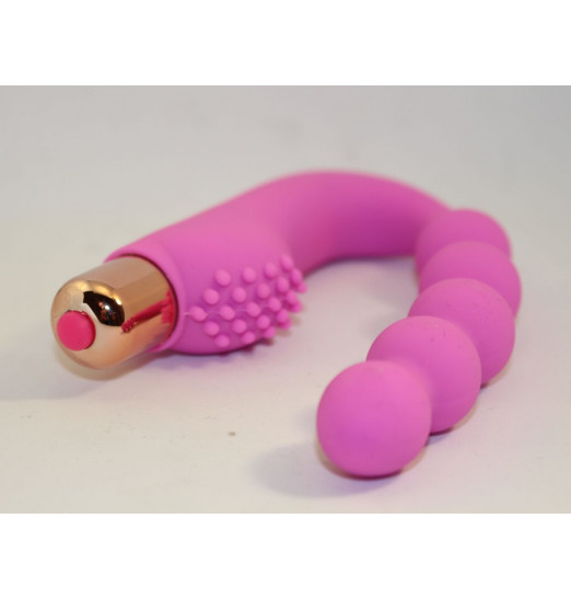 Розовый силиконовый вибромассажер в форме подковы