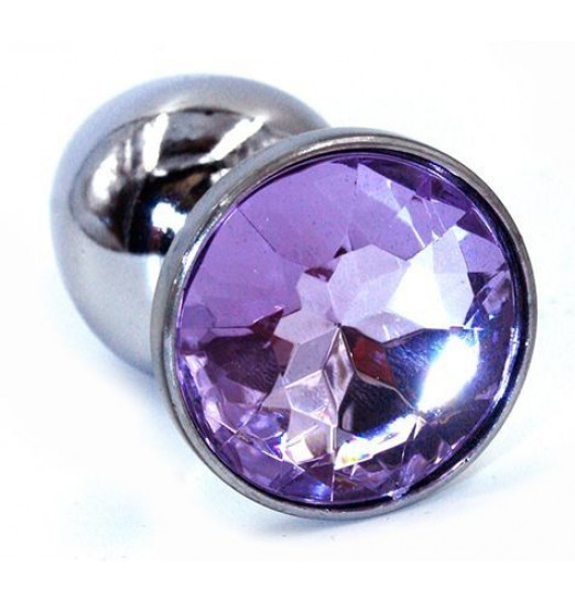 Серебристая анальная пробка с фиолетовым стразом - 7 см.
